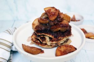 pancakes on cake stand topped with cinnamon apples 1