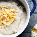 crockpot slow cooker baked potato soup in blue bowl 1