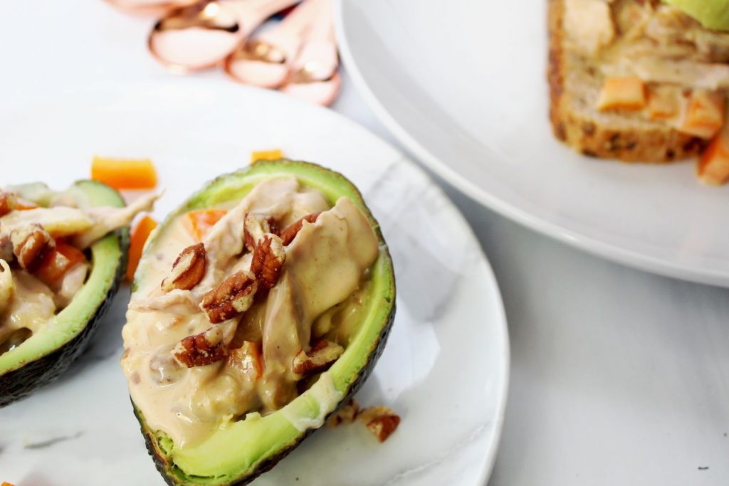 chicken teriyaki salad stuffed avocado with sandwich in back 1