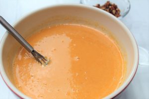 whisk eggs and spices into healthy crustless pumpkin pie 1